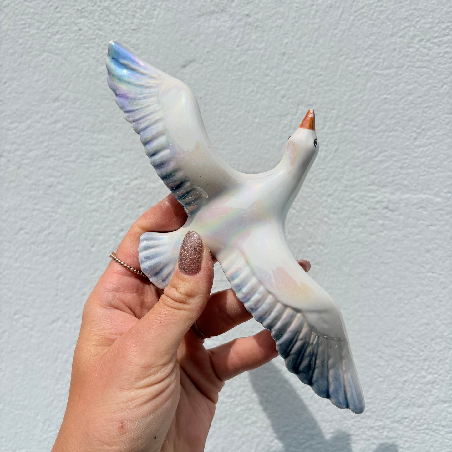 Oiseau en céramique irisée