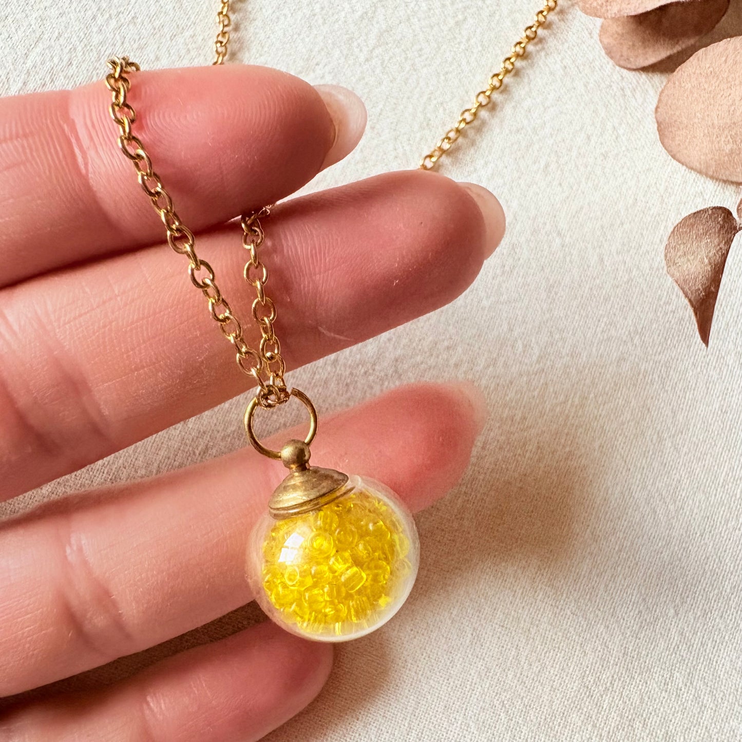 Collier avec perle boule