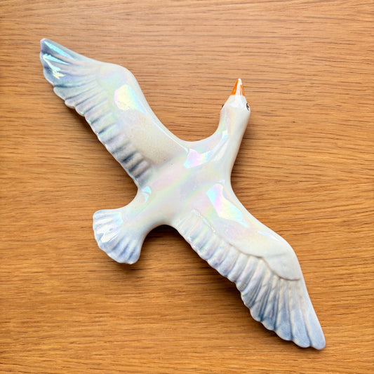Oiseau en céramique irisée